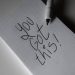 Inspirational handwritten note on graph paper with pen. Encouraging words 'You got this!'